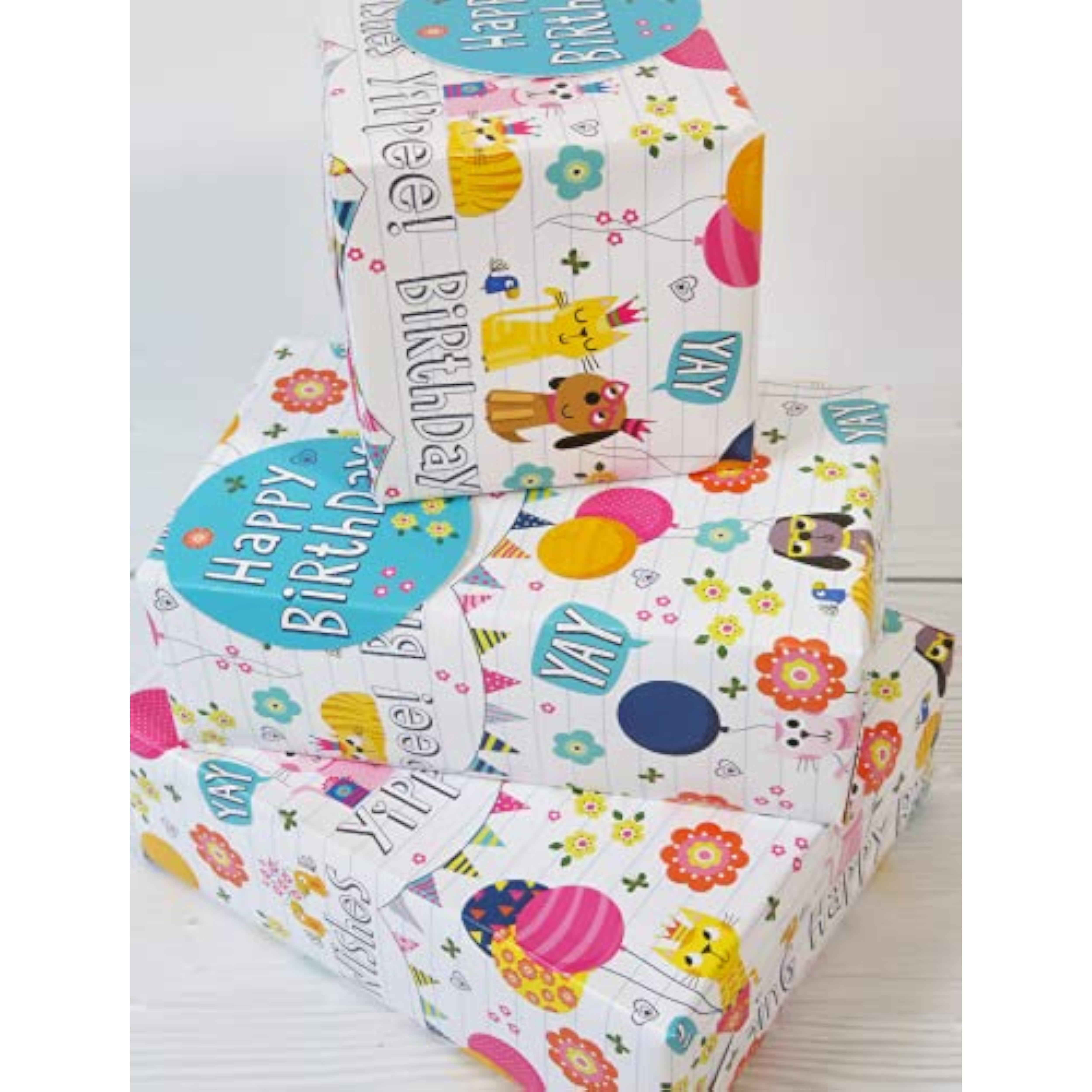Colorful birthday pet-themed gift wrap with matching tags from Abacus Cards, featuring playful animal illustrations on two sheets.