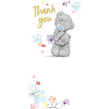 Soft plush thank you bear with flower from Carte Blanche, featuring a cute bear holding a colorful flower.