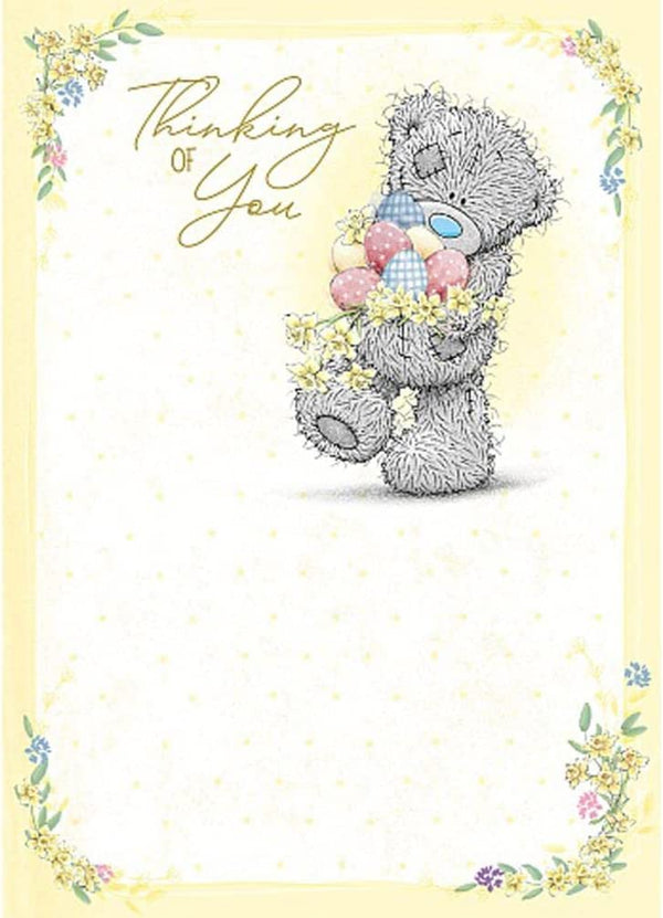 Carte Blanche plush Thinking Of You Bear holding a bundle of colorful Easter eggs, soft and cuddly for festive gifting.