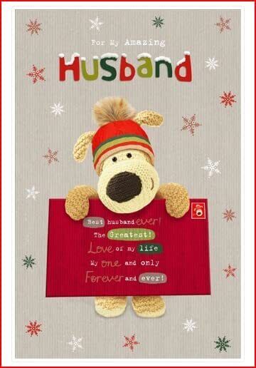 Boofle stood holding a big envelope-Husband (90)