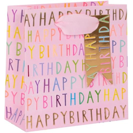 Pink luxury gift bag with "Happy Birthday" print from GLK, featuring elegant design and sturdy handles for special gift presentation.