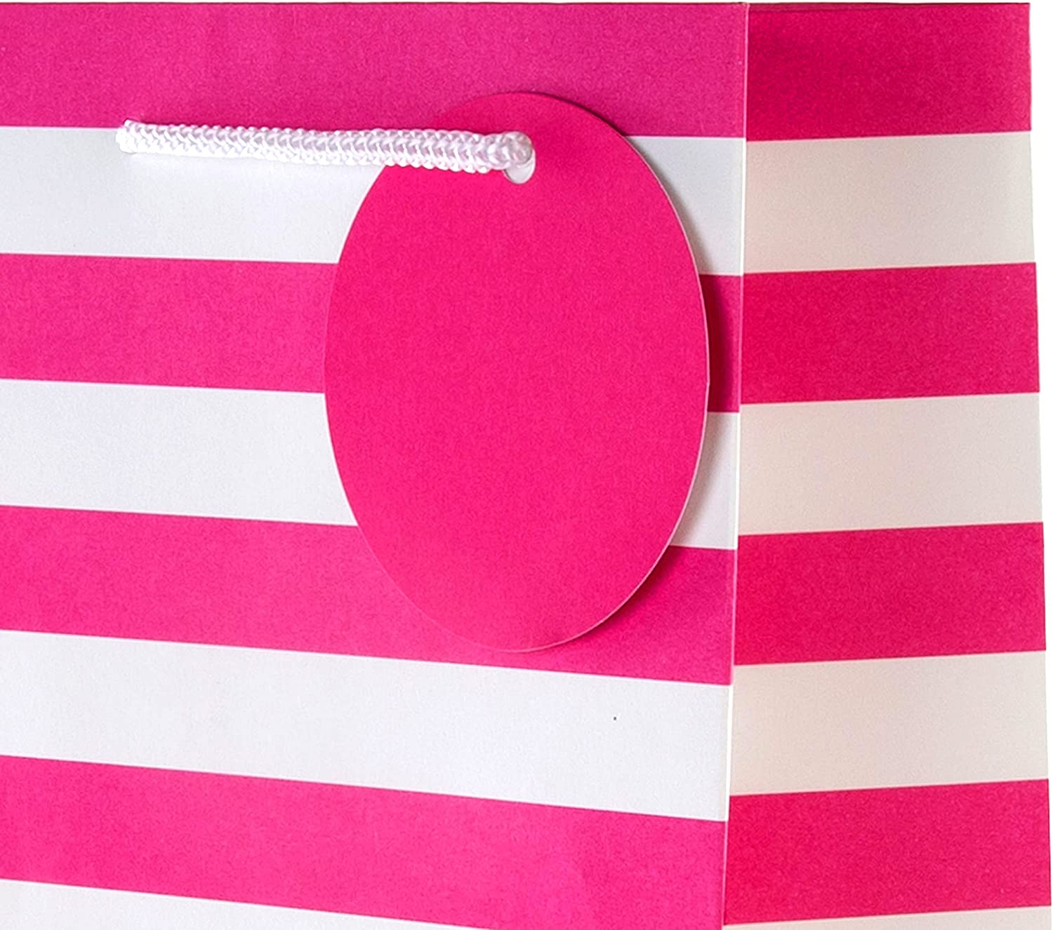 Pink Hallmark gift bag with elegant design, featuring chic style and suitable for gifting bottles or special occasions.
