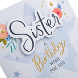 Hallmark birthday greeting card for sister featuring colorful flowers and star design, perfect for celebrating her special day.