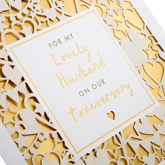 Laser-cut gold Hallmark anniversary greeting card for husbands, featuring intricate designs and heartfelt message.