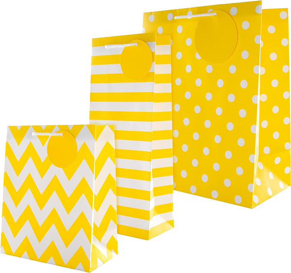 Yellow and white multi-occasion gift bag bundle with greeting cards from Hallmark, featuring cheerful designs for various celebrations.