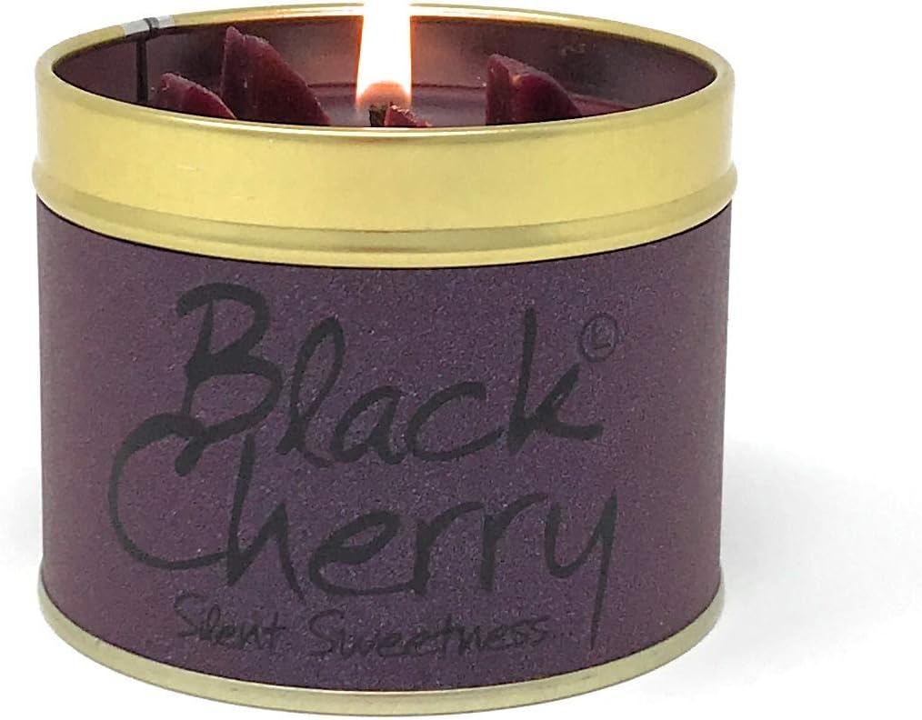 Black Cherry scented tin candle by Lily-Flame, showing a round metal tin with a cherry illustration and a lit wick inside.