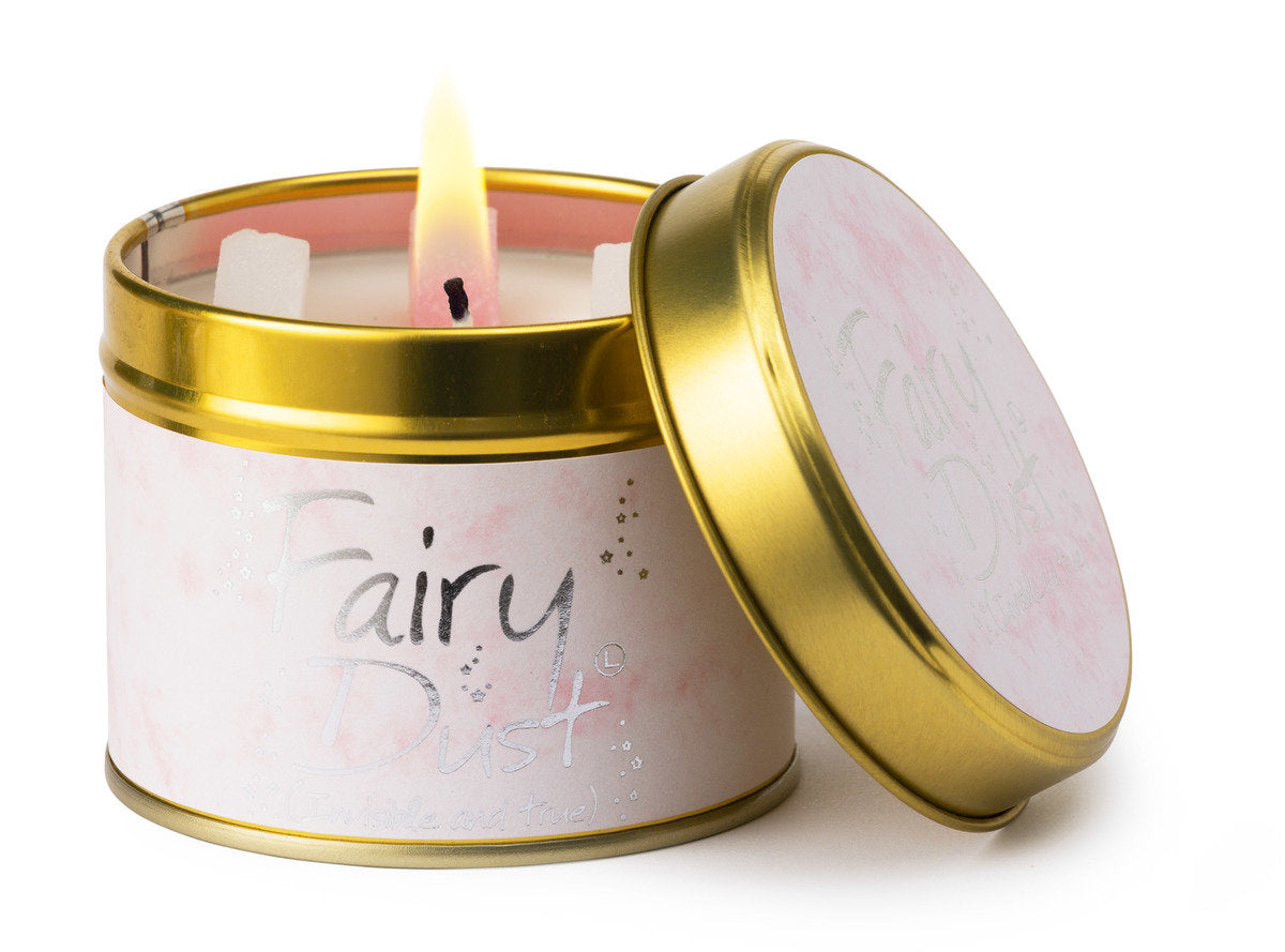 Lily-Flame Fairy Dust scented tin candle with colorful fairy dust design and a silver lid, perfect for adding charm to any space