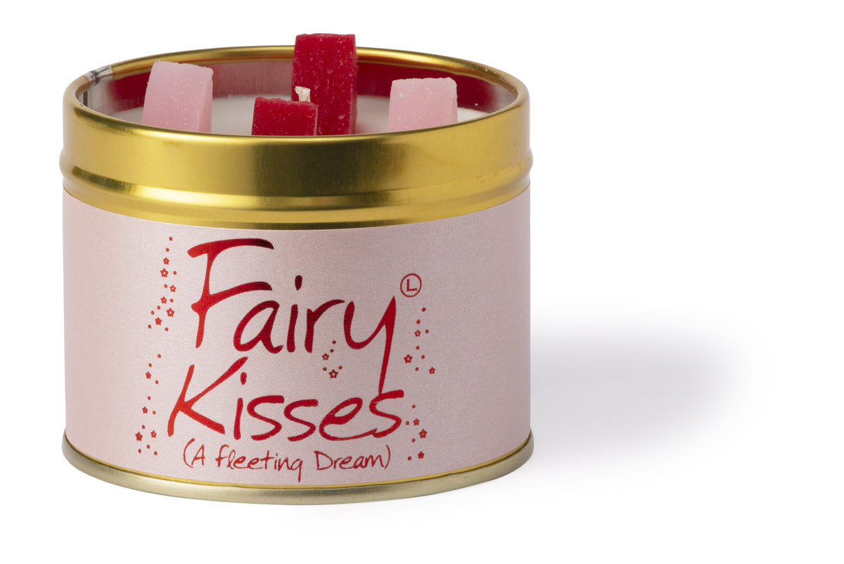 Lily-Flame Fairy Kisses scented tin candle with floral design and pink label, perfect for creating a cozy ambiance.