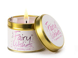 Lily-Flame Fairy Wishes scented tin candle with whimsical fairy design and floral accents on a white background