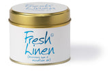 Lily-Flame Fresh Linen scented tin candle with a white label and metal lid, designed to add a fresh aroma to any space.