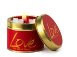 Love scented tin candle by Lily-Flame with a decorative floral design on the tin for cozy, fragrant ambiance.