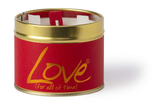 Love scented tin candle by Lily-Flame with a decorative label and a lit wick, perfect for cozy ambiance and fragrant home decor.