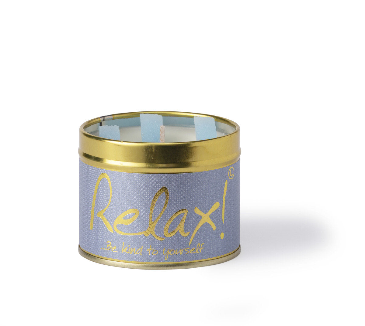 Lily-Flame Relax scented tin candle with a decorative label and a lit wick, emitting a calming glow.