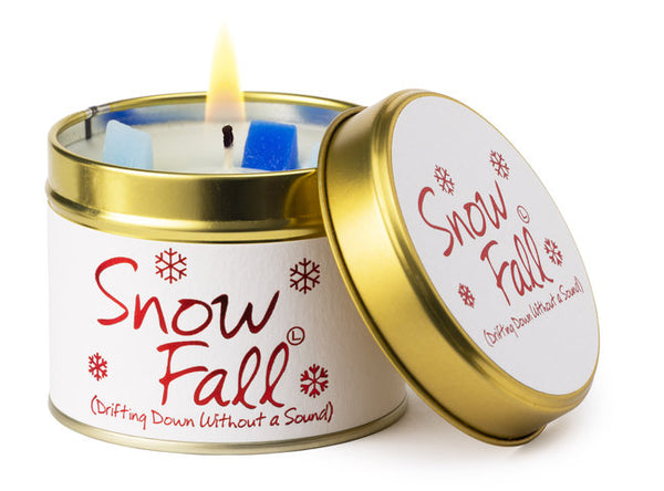 Lily-Flame Snow Fall scented tin candle with festive winter-themed design and a cozy, decorative appearance.