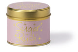 Lily-Flame Sugar Rush scented tin candle with colorful packaging and a decorative label.