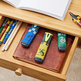 Set of four Maped Harry Potter highlighters with colorful ink tips and Harry Potter-themed packaging.
