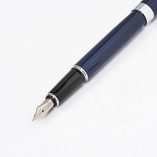 Dark blue Oxford Premium Fountain Pen with gold accents, showcasing its sleek design and elegant nib.