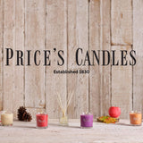 Large Magnolia scented candle jar by Price's Candle with a clear glass container and a white wax interior.