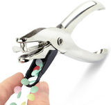 Rapesco 25 single hole puncher with capacity for 10 sheets of paper, compact office stationery tool for paper organization.