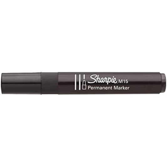 Sharpie M15 black permanent marker with bullet tip used to write on a greeting card, showing fine line details and ink flow.