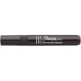 Sharpie M15 black permanent marker with bullet tip used to write on a greeting card, showing fine line details and ink flow.