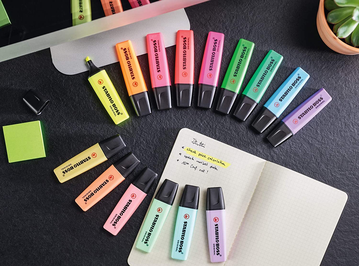 Assorted Stabilo Boss Original highlighters in a pack of 8 with vibrant colors and chisel tips for highlighting and marking text.