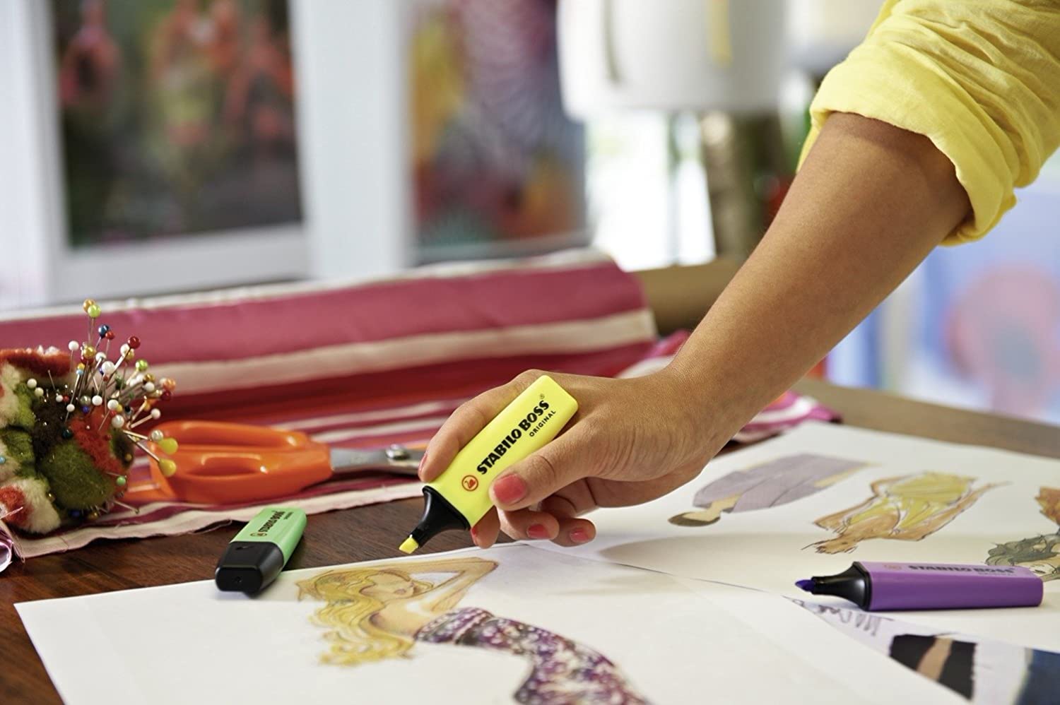 Assorted Stabilo Boss Original highlighter pack of 10 in bright colors, shown alongside a greeting card with highlighted text.