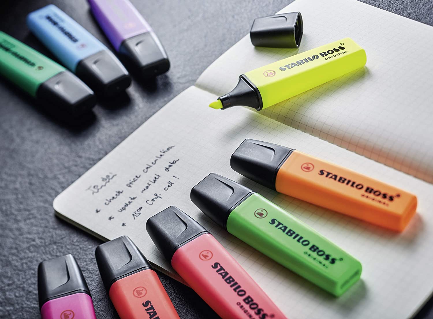 Assorted Stabilo Boss Original highlighters in a pack of 10 with colorful caps, displayed on a greeting card.