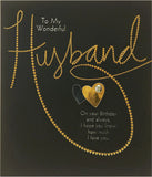 Husband golden heart birthday card with sentimental verse from UK Greetings, featuring a heartfelt design and gold accents.