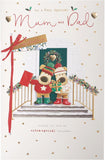 Christmas greeting card featuring Boofle gold foil design for mum and dad, UK Greetings festive holiday card with cheerful imagery.