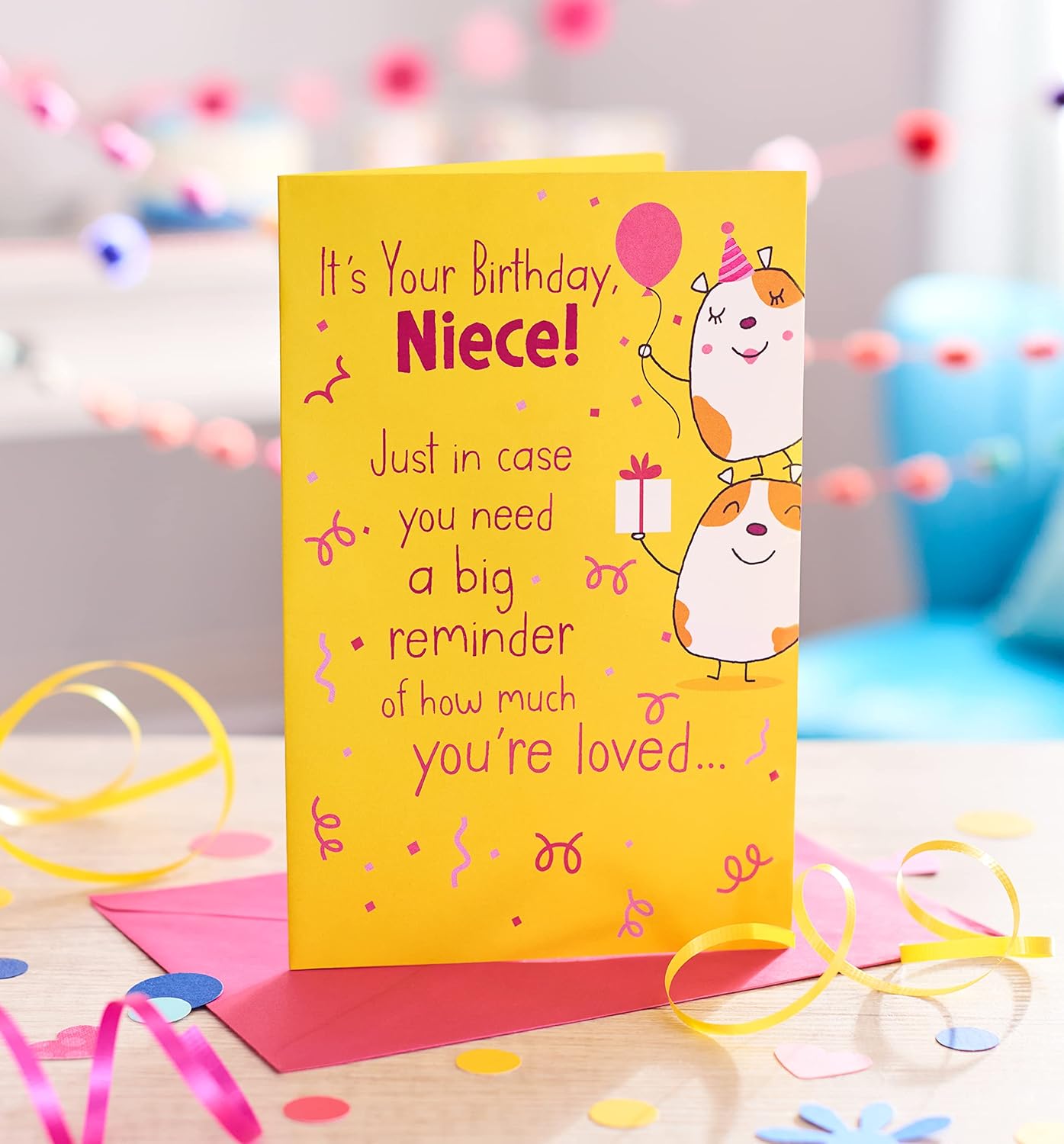 Colorful American Greetings birthday card for niece featuring cheerful designs and celebratory messages from UK Greetings.