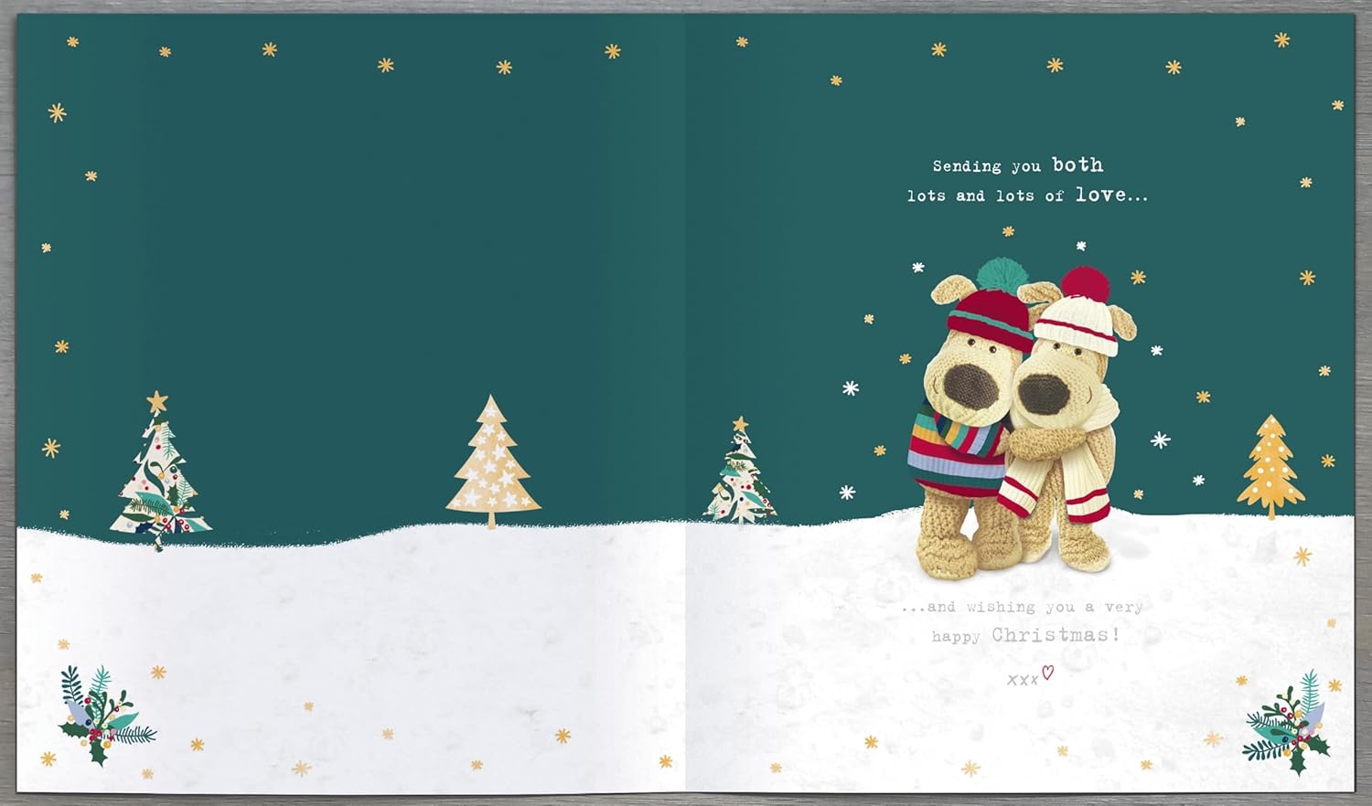 Boofle Grandma and Grandad Christmas card from UK Greetings featuring a cute illustration of grandparents sharing a hug.