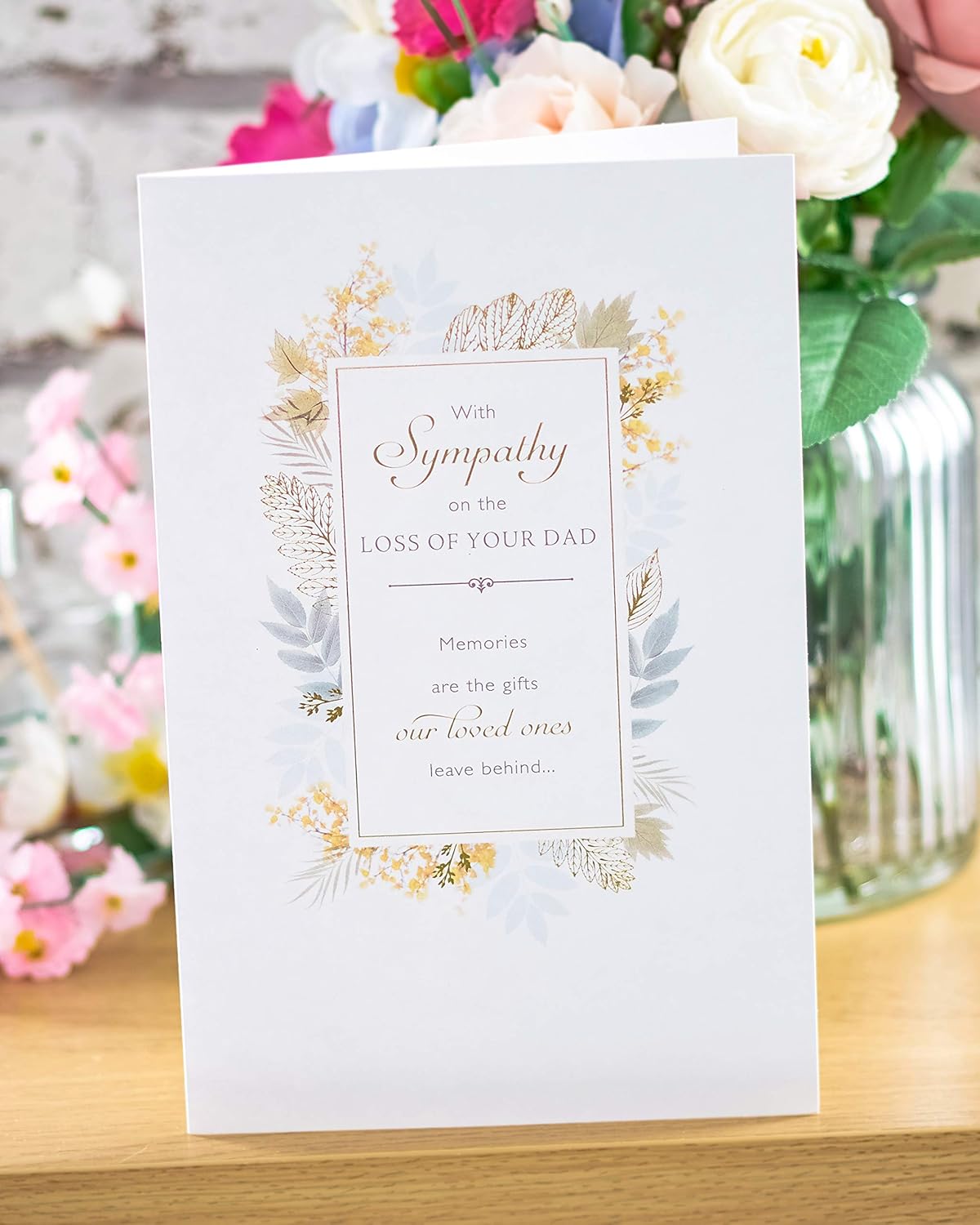 UK Greetings sympathy card titled "Loss of Dad" featuring heartfelt design for expressing condolences in times of grief.