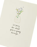 UK Greetings sympathy card featuring comforting words and an elegant design for expressing condolences.