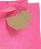 Bright pink large gift bag for all occasions, UK Greetings gift packaging with colorful handles and festive design.