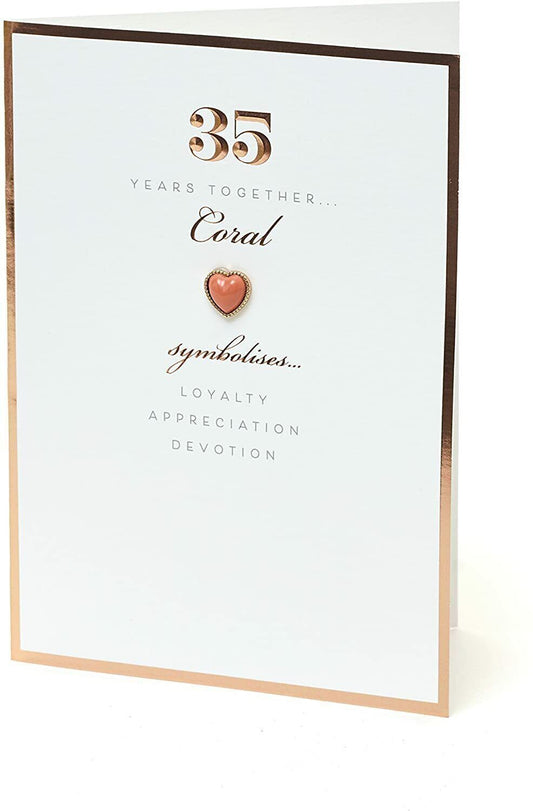 UK Greetings 35th wedding anniversary greeting card featuring a coral heart design with elegant decorative elements.