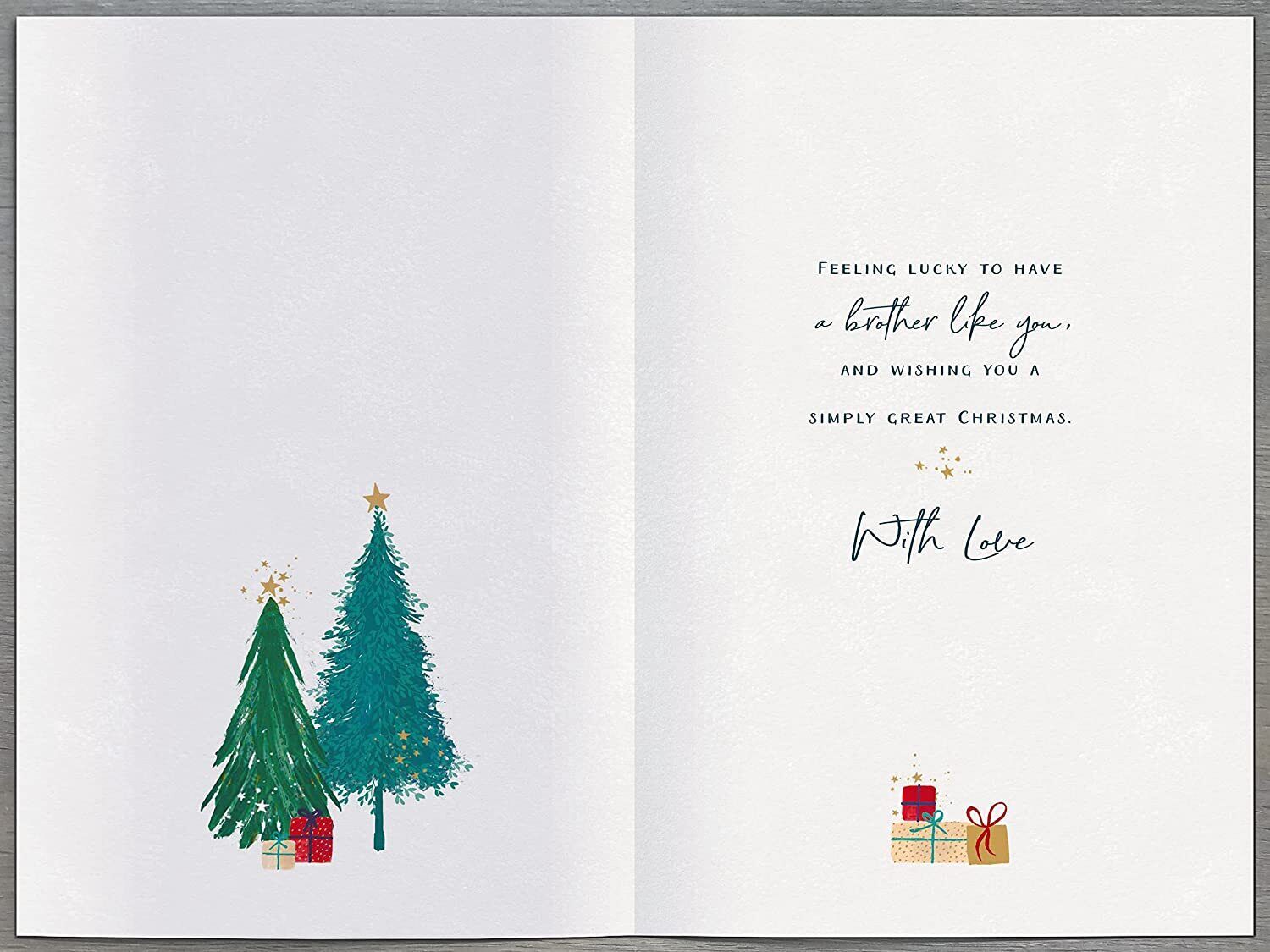Traditional foiled Christmas greeting card by UK Greetings featuring festive holiday design and elegant silver accents.