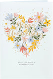 Floral heart design greeting card for him, her, or friend from UK Greetings, featuring a colorful floral pattern on the front.