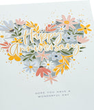 Floral heart design greeting card for anniversary, suitable for him, her, or friends, by UK Greetings.