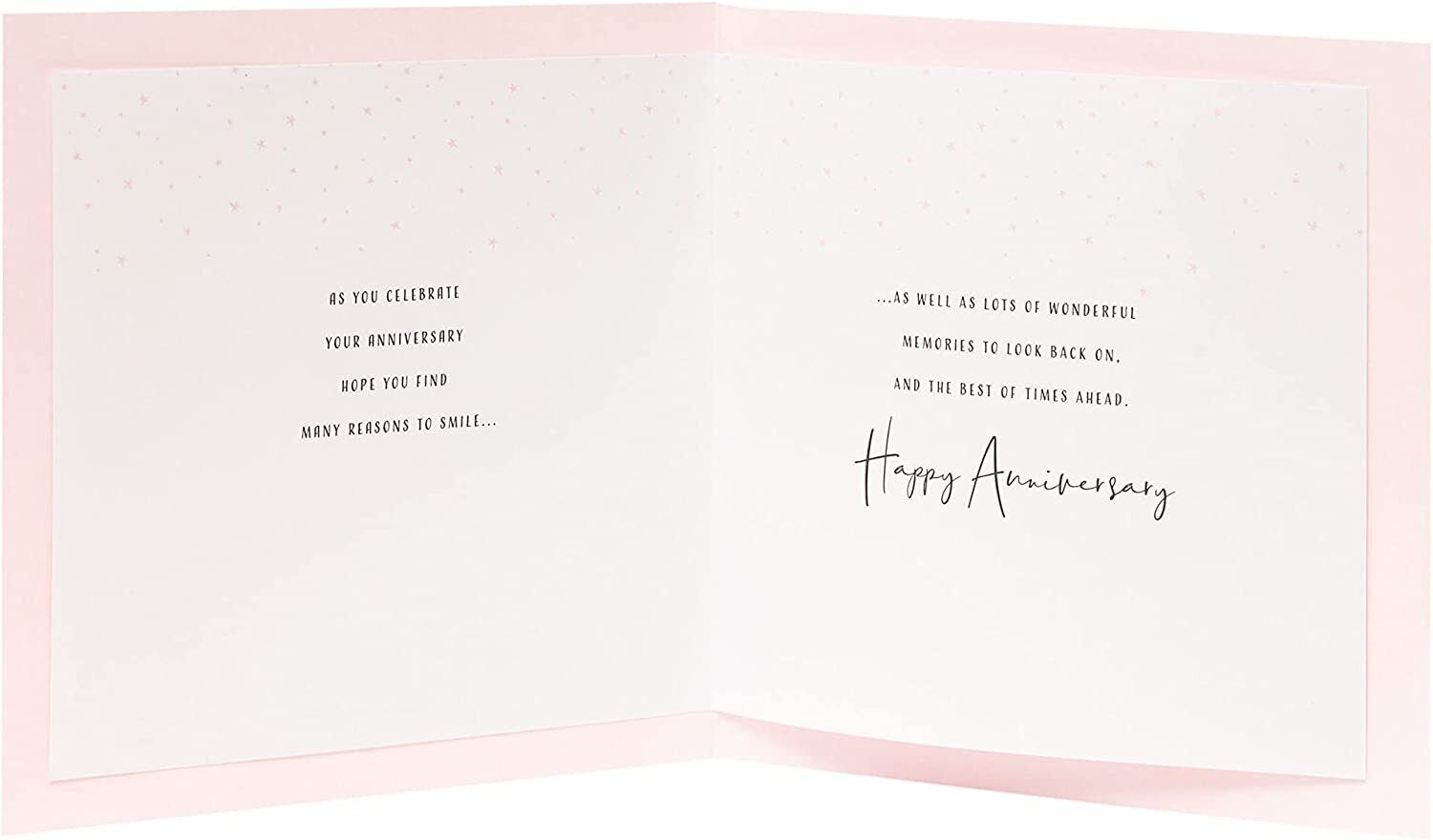 A greeting card from UK Greetings featuring a romantic design for a couple's anniversary celebration.