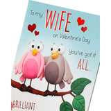 Cartoon wife Valentine’s Day greeting card featuring colorful bird illustrations and heartfelt message, by UK Greetings.