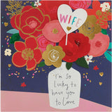 Greeting card for wife featuring a vase bouquet design, UK Greetings birthday card with floral and colorful illustration.