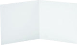 UK Greetings birthday greeting card and gift bag for him, featuring colorful illustrations and celebratory design.
