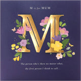 Dark blue Mother's Day greeting card with bold lettering and matching envelope from UK Greetings, featuring floral design.