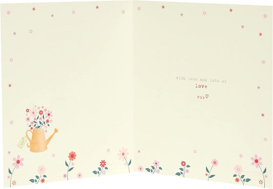 Cute Boofle birthday greeting card for granny with floral watering design and matching envelope by UK Greetings.