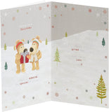 Cute Boofle Friend Christmas greeting card with festive presents design by UK Greetings, featuring colorful holiday illustrations.