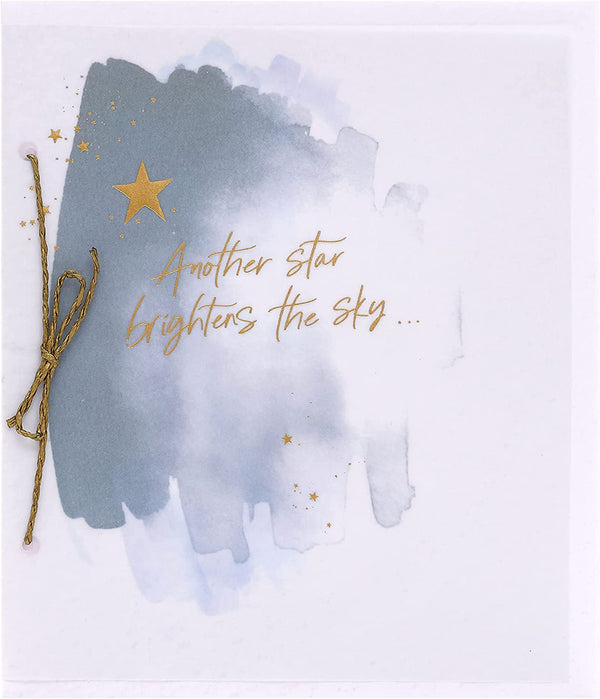 Gold star sympathy greeting card with celestial design from UK Greetings, featuring a heartfelt message for condolence and comfort.
