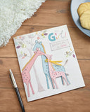 Charming new baby girl greeting card with floral design from UK Greetings, perfect for celebrating a baby's arrival.