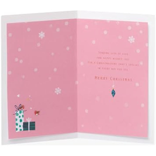 Christmas greeting card for granddaughter featuring a foil design with sweet presents, from UK Greetings.