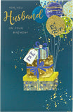 Contemporary husband birthday greeting card with colorful balloons and modern design, ideal for celebrating special occasions.